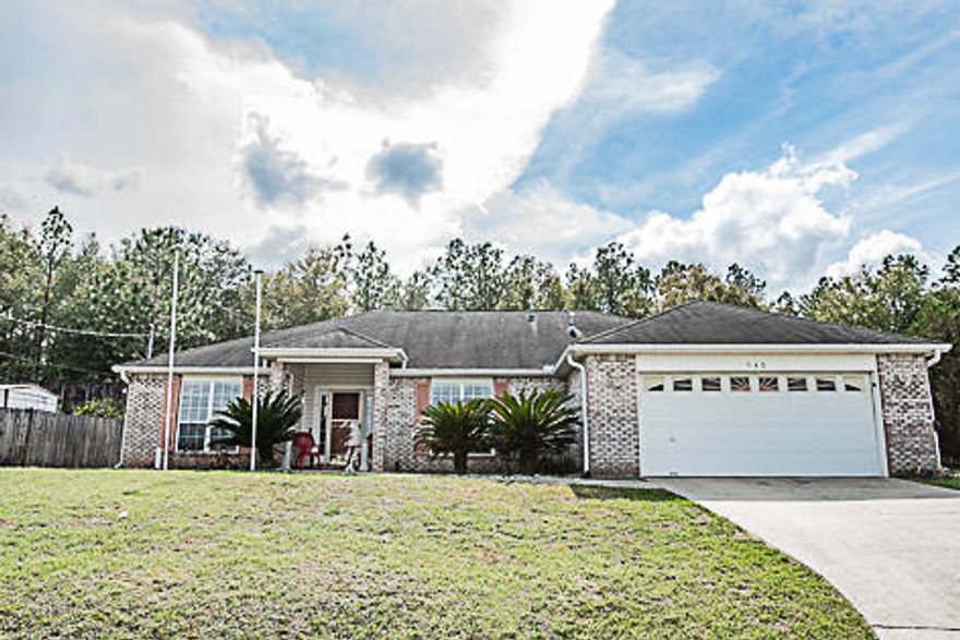 ...Almost 2000 square feet in South Crestview with easy commute to bases, beaches and shopping.  Vaulted ceilings, wood burning fireplace, natural light, open concept and spacious living areas to include a separate dining area for a large table and buffet.  Separate eat in kitchen area adjacent to the kitchen overlooking the back yard.  Breakfast bar and nice stainless appliance package.  Laundry room and 2 car garage.  Bedrooms are large as well as bathrooms.    The screened back porch area allows for additional lounging space.  This home has a massive back yard for entertaining.