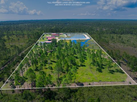 Photo of 3011 Garcon Point Road, Milton, FL 32583 (MLS # 983569) Photo of 3011 Garcon Point Road, Milton, FL 32583 (MLS # 983569)