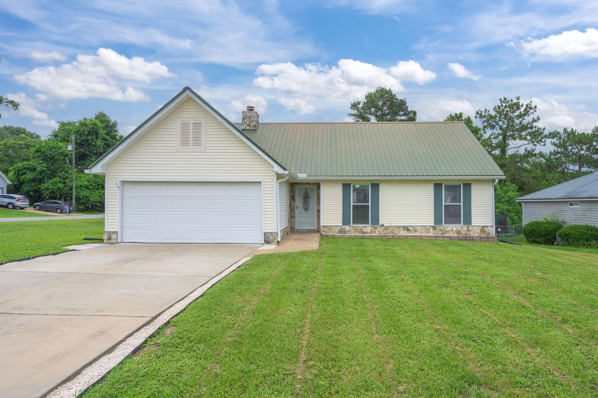 VA Assumable loan at 2.75% to those who qualify! This well-maintained home with a great location in south Crestview has very reasonable HOA fees at $84/year and lower County Property Taxes! The foyer welcomes you into the home as you step into the large living area with a rock-faced corner fireplace. The home has tile floors throughout. There's also a very large Florida room on the back side of the home. Updated master bath has a dual vanity and shiplap accent wall. 4th bedroom is upstairs and could make a great bonus room or theater room and there is lots of storage in the closet under the stairs. The laundry is located in the garage. The home has gutters with french drains & achain link fenced back yard. HVAC, 2016. WH, 2019. Metal Roof, 2005 with plenty of life left.