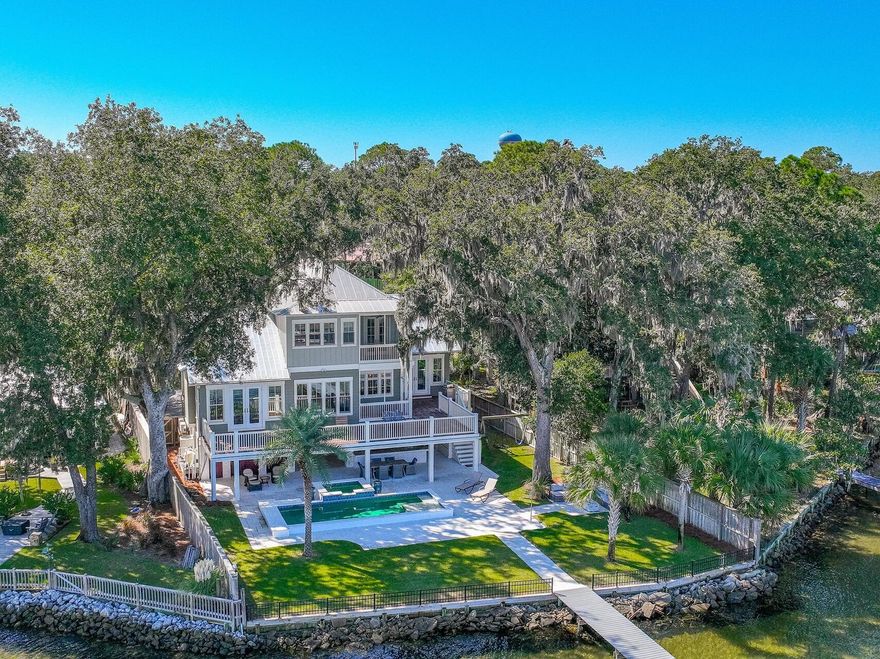 This bayfront house is the essence of waterfront living with its coastal design breathtaking views. Inside, you'll find spacious living areas filled with natural light, a gourmet kitchen with top-of-the-line appliances, and an open floor plan perfect for entertaining.  The house offers four generously sized bedrooms (all ensuite) each thoughtfully designed with comfort and relaxation in mind. Two master suites feature panoramic views of the bay and private balcony, offering a serene retreat at the end of the day. Stepping outside onto the large deck, residents are met with an outdoor oasis. The large entertaining area with saltwater pool and hot tub provides plenty of space for hosting gatherings with family and friends whether it's a barbecue by the pool or a sunset cocktail party overlooking the Choctawhatchee Bay. The highlight is the private dock, where you can relax and watch dolphins swim by, adding a magical touch to your coastal living experience.
For those who love spending time on the water, this property has a covered 10K lbs boat lift, allowing easy access to boating adventures right from the backyard.
With its perfect blend of indoor and outdoor living spaces, many amenities, and unparalleled waterfront location, this Bayfront house is a true coastal paradise, offering a lifestyle of luxury and relaxation for its fortunate residents.
Located just minutes from the vibrant dining and shopping scene of 30A, white sand beaches of Emerald Coast,  this home offers the ultimate coastal lifestyle. Don't miss your chance to own a piece of paradise in Santa Rosa Beach!
