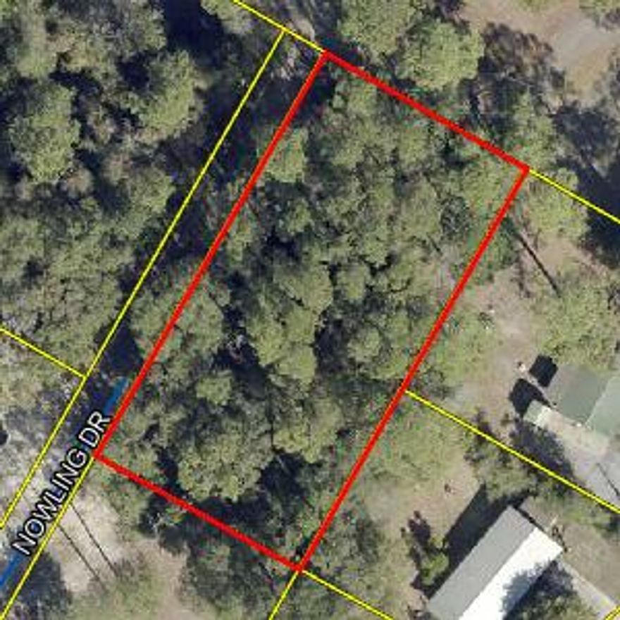 This lot is located at the dead end of Nowling Street and next to beautiful Lake Stanley Park. You are just minutes from downtown DeFuniak Springs and everything this charming town has to offer. At just under a half-acre, you can build your dream home and still have room for a nice size yard and/or shop. Property like this is a rare find inside the DeFuniak Springs city limits, so come check it out and see if this is right property for you.
