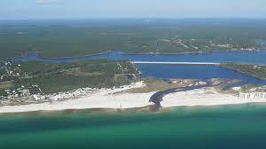 Over a 1/2 acre in BOOMING INLET BEACH, located next to Rosemary Beach/30A to the West, Lake Powell to the East.Upscale shopping and restaurants, public Beaches with facilities and 3 boardwalks to the South....all within walking distance!! Just 10 minutes to Pier Park and 25 minutes to the Panama City Beach airport.