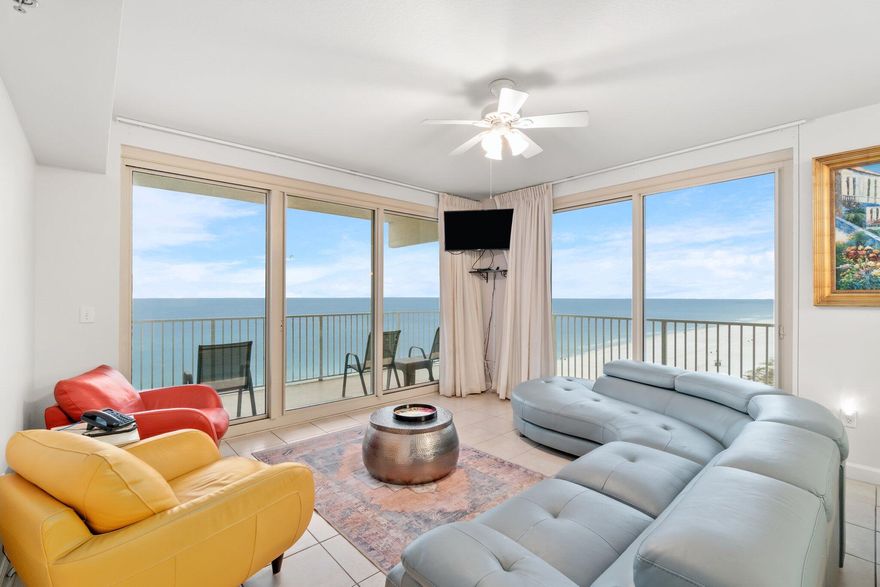 Absolutely breath-taking PANORAMIC VIEW of the gulf from this beautiful three bedroom unit. The ''D'' floor plan has the most incredible SUNSET VIEW you'll ever see in a condo. The wrapped-around balcony gives it that unique feel that allows you to see some amazing views all along the coastline. With parking on the same floor, this 3br/3bath unit generates income like no other. It features a kitchen with white appliances that blends so well with the walls, granite countertops, nice breakfast bar area, tile floors throughout the entire unit, and comes fully furnished with touch of bright popping colors that accentuates the beauty of this space. All the bedroom furniture are newly replaced. The building also has array of amazing amenities, the most recent being the pizza, ice/donut shops