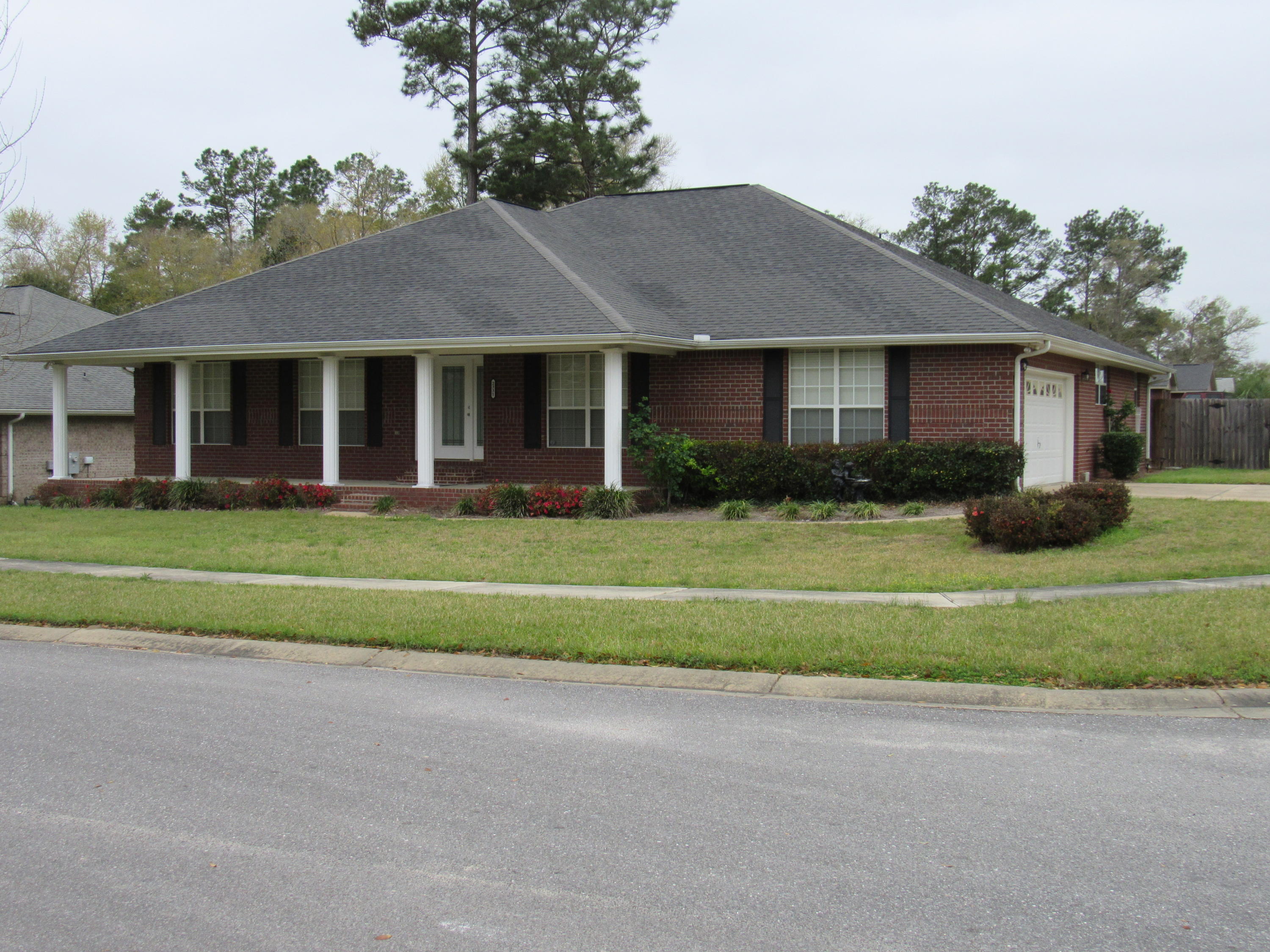VA COMPROMISE SALE**MOTIVATED SELLER**Beautiful, 4 BR/3 BA home, over 3100 sq ft, in Northwest Crestview located in the quiet Nanterre Estates community. Large corner lot w/side entry garage. This home has decorative brick exterior w/columns and a large front porch-- perfect for relaxing - just bring the rocking chairs!! The sidewalks, street lights & mailboxes add additional charm. Walk into a large entry way, office/den to right, dining and into a HUGE family room with electric fireplace, vaulted ceilings with surround sound wiring. CALLING ALL COOKS to this awesome kitchen-- plenty of cabinet & counter space, under cabinet lighting, granite countertops, desk area and center island as well as bar area for a quick bite instead of using the main breakfast area.