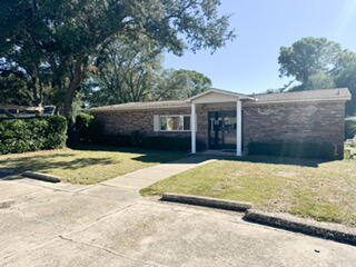 COMMERCIAL/RESIDENTIAL MIXED USE ZONING located in the City of Ft. Walton Beach. Currently set up as an office building. 4 offices, 2 half baths (toilet & sink) an additional half bath (shower & sink). 2 large open spaces along with an open kitchen area which includes refrigerator, stove/oven.