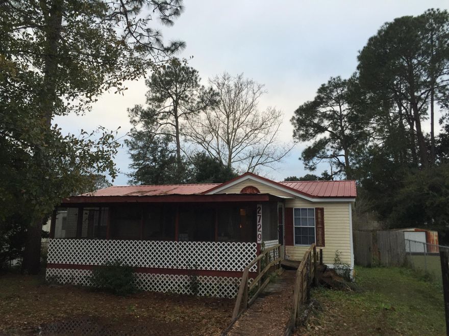 PRICE REDUCED! Motivated Seller! Great home located 5 Minutes from the Panama City Mall. Priced to Sell! This home has a new Metal Roof Installed about 6 months ago! Has a front porch that is enclosed and Screened in. Nice front yard area. Fenced in back yard with a small covered porch. Small tool shed located in the back yard. 2 Bedroom 2 bath room beauty! Some small TLC and this will be a great home to live in or use for investment property.