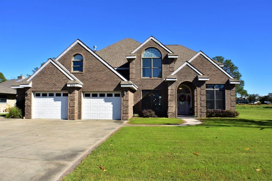 This Bay Point beauty is ideal for a large/growing family and for someone who wants to work out of their home! This 4BR/4BA all-brick abode has been recently updated and is the perfect blend for entertaining and function. The home features an office, formal living and dining rooms, large contemporary kitchen with breakfast nook, family room with built-ins and fireplace, and a two car AIR-CONDITIONED garage with extra golf cart parking bay. The bedrooms are on the second floor with the Master Suite and en suite facing a pretty pond on the soon to be redeveloped golf course! There is a huge bonus room off one of the additional bedrooms that would be ideal as a play or rec room! Another great feature is the transfer switch from AC to generator which is a big help during storm season The backyard is quite large with plenty of room to add a pool! The vinyl plank flooring is new, the roof is only 4 years old, and the interior has been freshly painted. Bay Point is a gated community with 24-hour security, marina, tennis courts, spa, and two golf courses (one to be rebuilt). All info is approx and must be verified by Buyers if important.