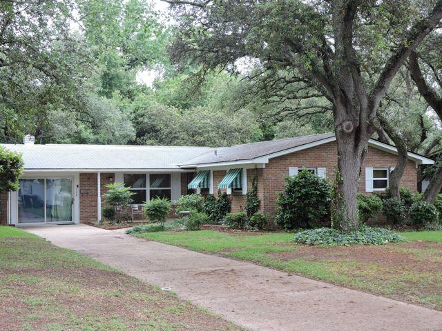 Gorgeous remodeled home located in central Fort Walton Beach! Convenient to all bases with easy access to all parts of town!Full remodeled, (see documents for list of upgrades, if trouble viewing please contact agent) a long driveway leads up to a wonderfully shaded, all brick home. Featuring an open and spacious living room with built in book cases and many windows to make it bright and airy! From the living room you enter a beautiful kitchen with brand new Stainless Steel appliances! Enjoy your morning coffee on the large covered patio or the winter nights around your retro fire pit! Backyard is large and fenced to give you your privacy!All wiring has been updated, including the Panel Box. Double Pane windows throughout to help save in energy costs along with brand new plantation bli