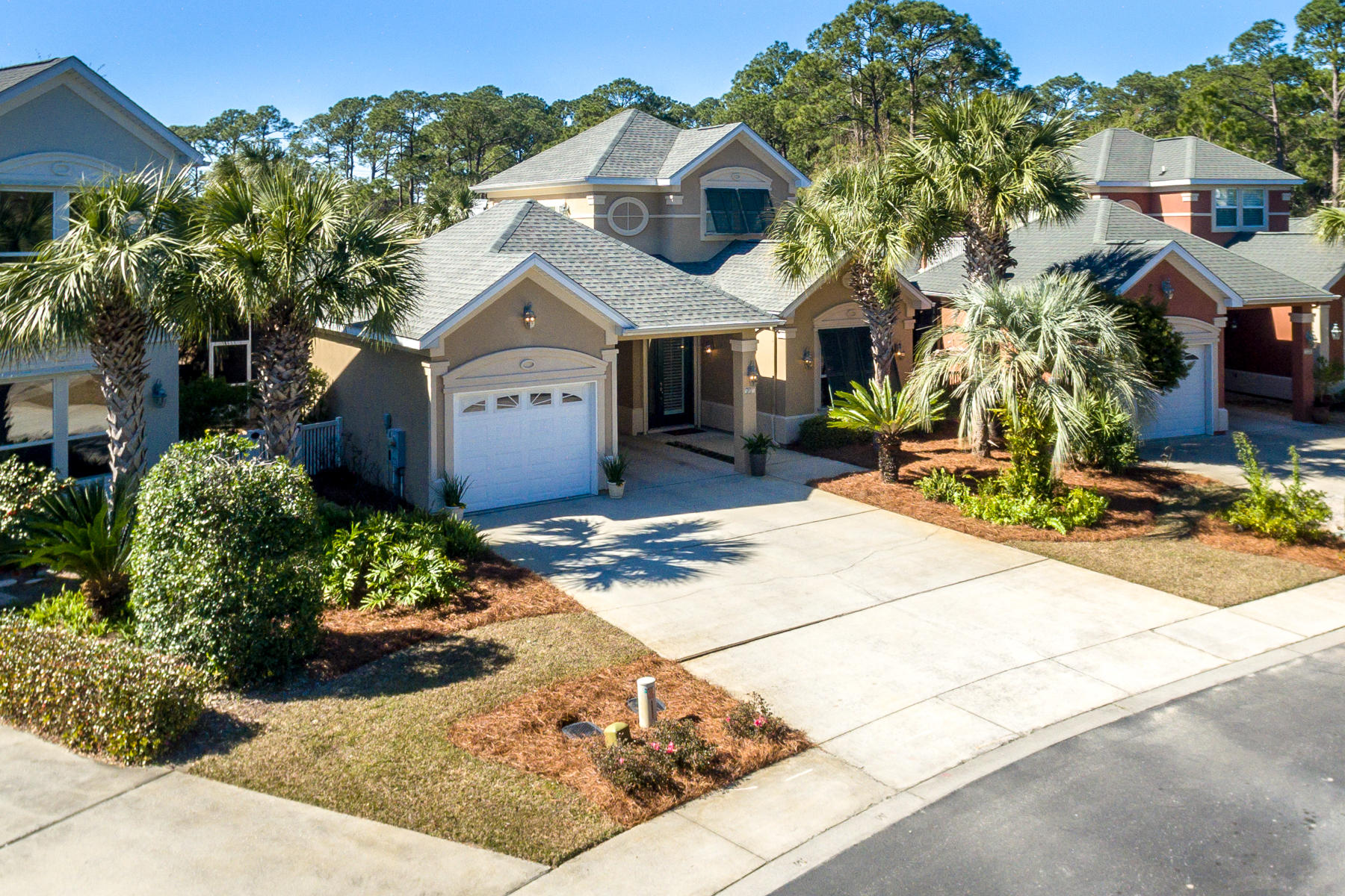 Move In Ready! This updated and well maintained home offers a new roof, Rinnai tankless hot water system, new exterior doors, hurricane shutters all around and much more. The 3 bedroom, 3 bath home has an open floor plan with first floor master bedroom with two closets. The home has an oversized 1 car garage and covered carport, loads of storage, open deck, a lovely outdoor patio area AND large screened porch. Updates include bamboo floors, granite kitchen counters, stainless appliances in a floor plan customized by the original owner. Fairway Villas is a highly coveted 30A west end neighborhood off Allen Loop which is perfect for a primary residence or second home. Located adjacent Santa Rosa Golf & Beach Club and a short walk across Oyster Lake to the beach or over to the Vue on 30A
