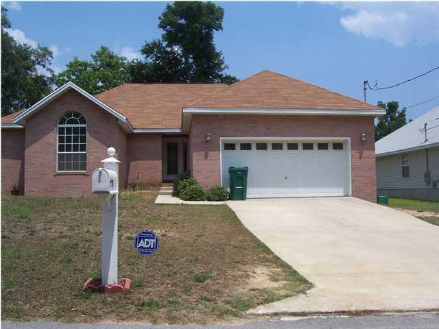 Newer Brick home in the Heart of Niceville. 3 bedroom, 2 bath, with 2 car garage. Wood burning fireplace, coffered ceiling, eat in area off the kitchen, and a great room. Kitchen appliances include stove/oven, dishwasher & refrigerator (non-warranted). Owner will consider a pet with a $255.00 non refundable pet fee. Available for move in on 08/25/2015. Owner will consider a pet with a non refundable pet fee of $255.00. All adults living in the unit must apply and be on the lease