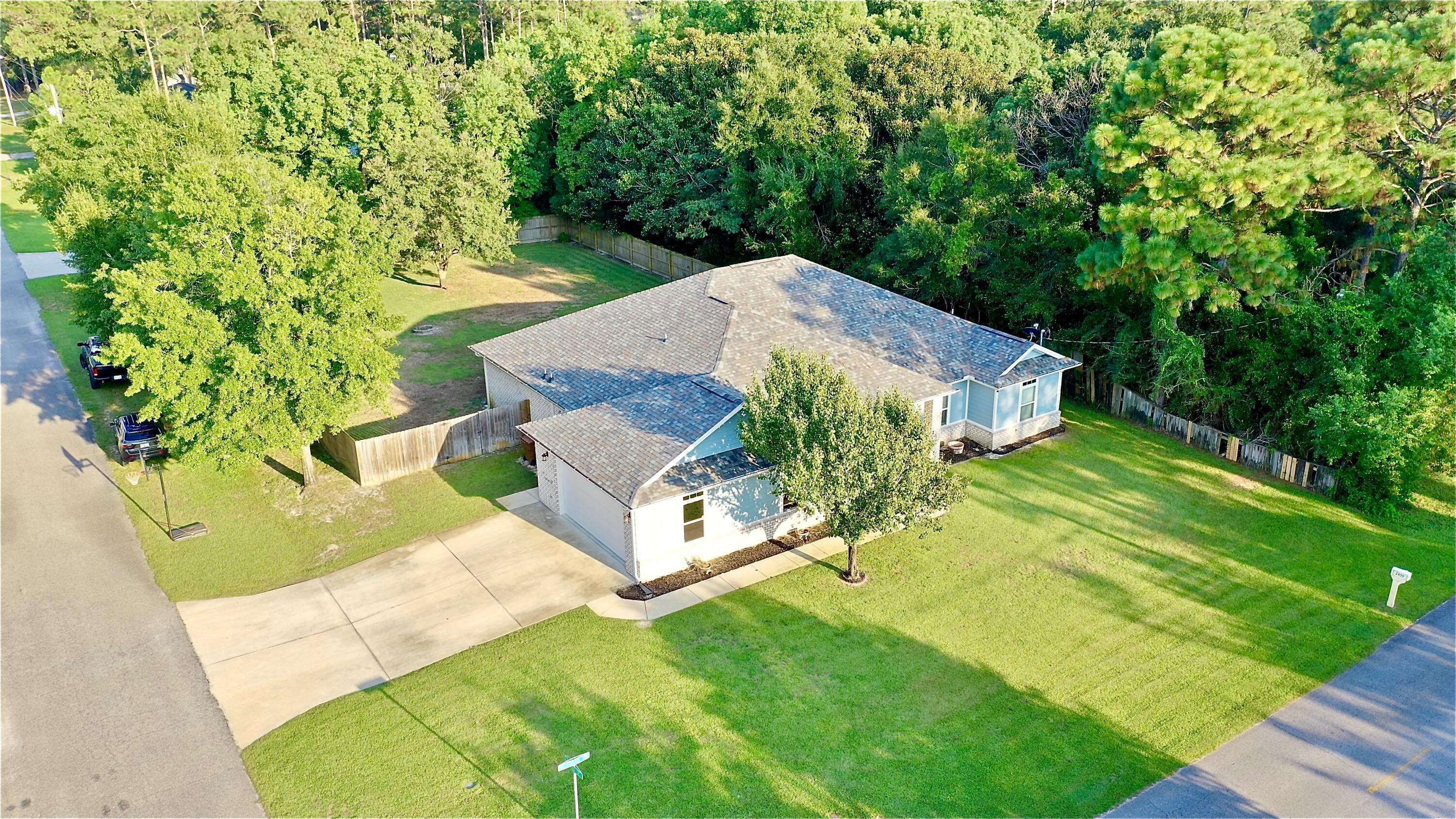 This beautiful home is a 5 bed, 3 bath with an office room. The home was built in 2019, with 2,443 spacious sqft. Has a fenced in back yard with a deck in the back on 0.459 acres On a corner lot, the trees on the outside of the backyard fence are part of the property so will never be removed, great for privacy. This home also comes with all appliances included as well as the washer and dryer.  Large 2 car garage, no HOA open floor concept, sprinkler system, attic, and backyard shed.