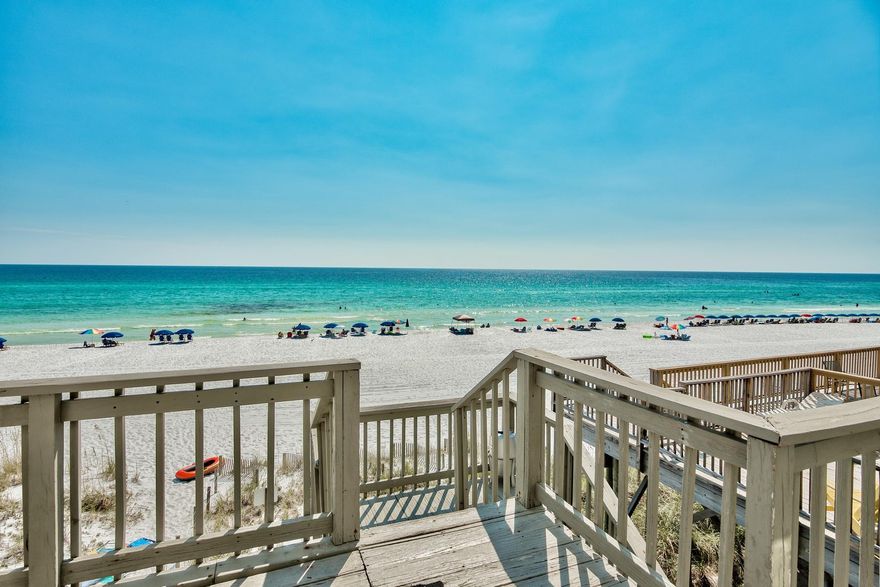 Beautifully remodeled, this prominently positioned town home offers pristine vistas and endless sunset views over the emerald green waters and white sand beaches of the Gulf of Mexico. This corner unit has exceptional rental history with over $70,000 in gross collected annual income. Notable features include an open floor plan with ample windows allowing for natural light as well as framing extraordinary unobstructed gulf views. The kitchen and living room are located on the second level and offer stainless appliances as well as recently updated professional decor. The master bedroom is situated on the third floor and allows for 180 degree water views as well as a full ensuite bath. The first level is highlighted by two conveniently located suites one of which is positioned directly on the