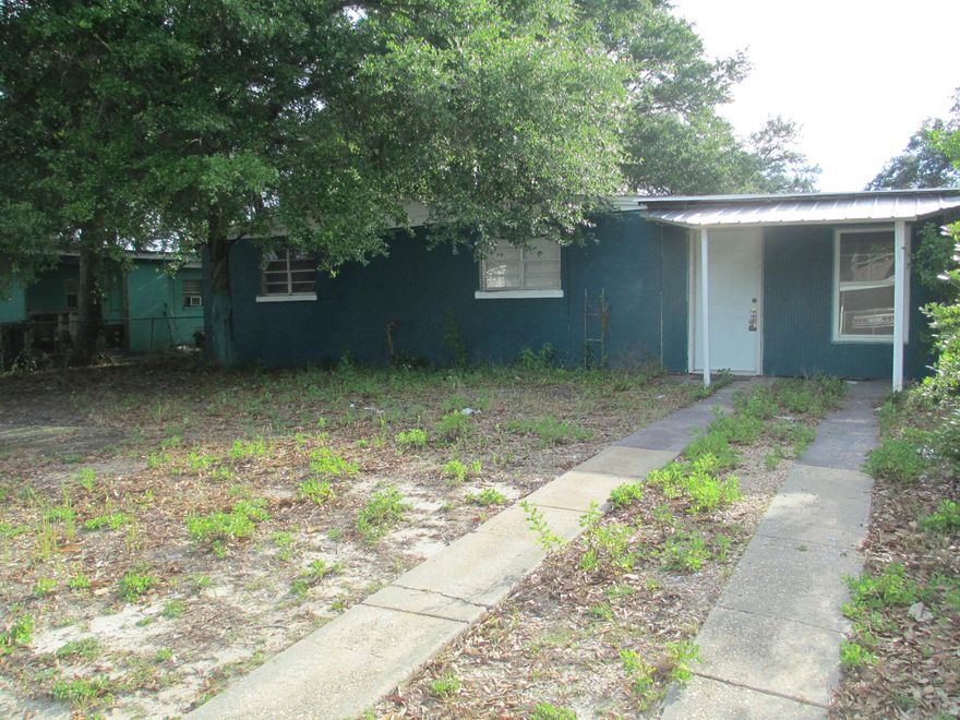 Property is being sold ''AS IS''and priced at land value! Not in showing condition. Need extensive repairs. Only Cash offers will be accepted.
