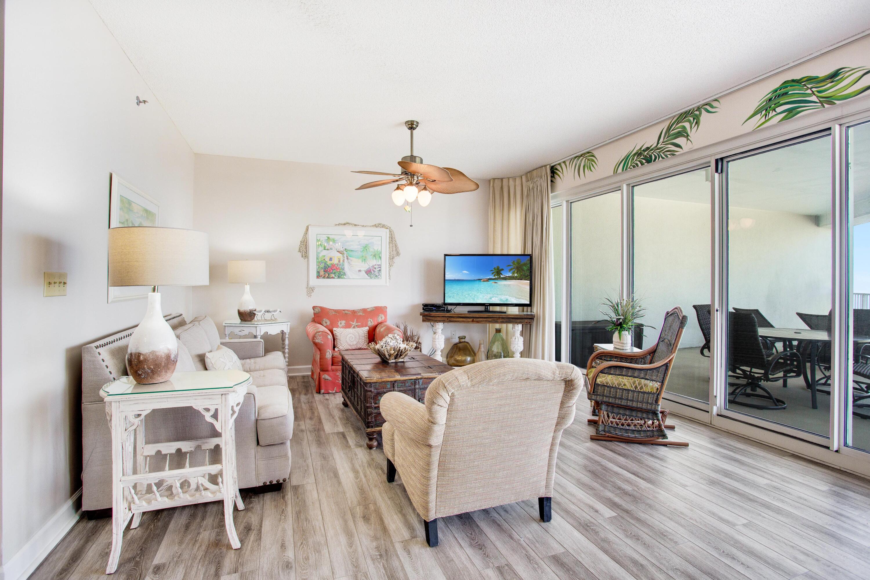 Located in the exclusive 52 acre gated community of TOPS'L Beach & Racquet Resort, this 7th floor condo has beautiful views of the Gulf of Mexico and the pristine sugar white beaches of the Emerald Coast. Upon entering you are greeted with a cozy coastal charm that does not disappoint. Floor to ceiling sliding glass doors across the living and dining areas allow for lots of sunlight. Relax on the 400 sq ft oversized balcony with your morning coffee or after a long day at the beach. The updated kitchen features granite countertops and stainless steel appliances, as well as a full-sized stackable washer & dryer that will make laundry a breeze. The en-suite bathroom includes granite, a large soaking tub, separate walk-in shower, and a granite dual sink vanity. Guests enjoy their own bedroom