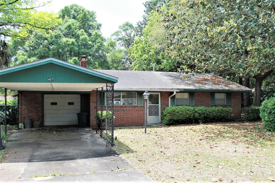 Motivated Seller!! Great investment opportunity!! This 3 bedroom, 2 bath home, with pool is being sold As-Is. All brick home, with living room and family room with fireplace. The large family room opens up onto the pool area and large private back yard. In addition to the single car garage, this home also has a carport. Large back yard with mature trees. Cute home with tons of potential!! This home is also close to the community park. Buyer to verify all dimensions.
