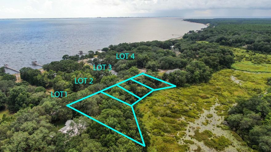 ***This listing is for just lots 3&4 *** SELLER WILL OWNER FINANCE, ASK AGENT FOR TERMS. Take a look at this absolutely breathtaking property just 1 block from Choctawhatchee Bay! This property borders Eglin reservations property. Your backyard will be untouched scenery of wild life.  There are water mains on all 4 lots.  So many possibilities with this property! Buyer must verify all measurements to own satisfaction.