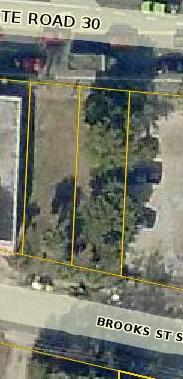 2 vacant parcels with Brooks Street and Hwy 98 frontage each is 25' by 95' roughly, property is between the Wayne Patton Building and Hard Body Gym, located in historical downtown Fort Walton Beach,