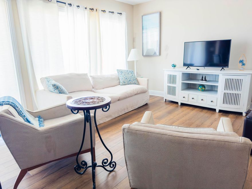 Destin 2BR 1BA + Laundry Room and Balcony! Active on Airbnb with over 10k in bookings until August 1. The property is located on the second floor with a large balcony, featuring updated LVP flooring, stainless steel appliances, granite countertops, new patio slider doors, new water heater (2022) and New HVAC system (2023). Whether you're looking to invest or settle down, this property offers great value for your investment. The complex has a range of desirable amenities, including gated entrances, 3 sparkling swimming pools, soaking up the Florida sunshine, Tennis & Pickle Ball court, gazebos, green spaces, large lake, picnic areas and outdoor barbecues.