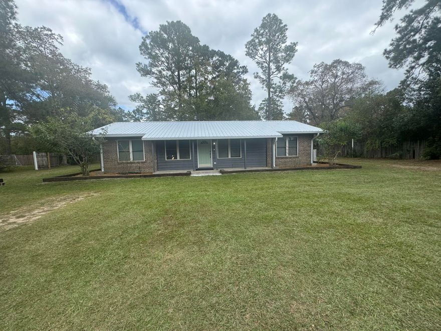 Come check out this beautifully renovated home, just minutes from downtown DeFuniak Springs! Located in a highly sought after area, you are within a few minutes of I-10 and just over thirty minutes from the beautiful beaches of South Walton. This home was completely renovated in 2023, with a new roof, HVAC, hot water heater, and interior features all upgraded. The lot is a just under half an acre, so it leaves plenty of room for the addition of storage shed, shop, or even a swimming pool. Ther are also several fruit trees and blue berry bushes on the property. The current owners use this property as an Airbnb and have no problem keeping this property rented. So, whether you are looking for your forever home or a great investment property, this property has what you are looking for