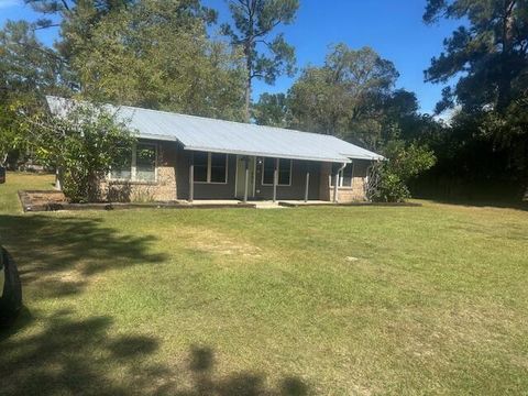 Photo of 5827 Coy Burgess Loop, DeFuniak Springs, FL 32435 (MLS # 984679) Photo of 5827 Coy Burgess Loop, DeFuniak Springs, FL 32435 (MLS # 984679)