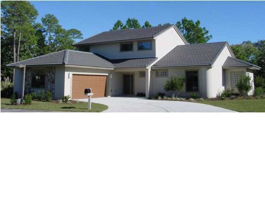 Check out this great looking home located on a beautiful golf course and lakefront lot. Stucco exterior, tile roof, and a fabulous floor plan! Two story great room w/built-in media center/Formal dining room/Large kitchen and breakfast nook overlooking the lake/Master suite plus additional bedroom with full bath on the main floor/Screened porch. Master suite features a corner whirlpool tub, separate walk-in shower, huge walk-in closet, separate vanities, and beautiful tile work! Second story offers two large bedrooms, full bath w/double vanity and a loft open to the great room...perfect computer area or playroom. Oversized side-entry garage. Special features include: Granite countertops/Surround sound/Gas fireplace/Low maintenance exterior! Association dues include lawn maintenance(not s