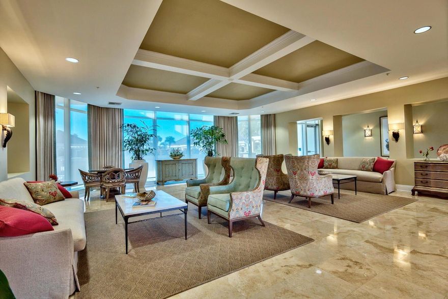 This beautifully decorated, stunning 2 bedroom 2.5 bath water view unit will dazzle you and I promise, it will NOT disappoint the most discriminating buyer!  The unit is immaculate and has had a complete makeover in 2020.  The tastefully done kitchen has KitchenAid stainless appliances and quartz countertops. There are custom, electric shades in bedrooms and living area and the bedroom shades are black out shades.  The bathrooms are beautifully  decorated with quartz countertops.  The lovely, high-end furniture and decor will convey with the unit!  This unit includes a deeded golf cart, garage space (#4) in the brand new golf cart parking garage.  As an added bonus, the seller will be including her 2017 Tomberlin, 6 passenger golf cart, with Bluetooth Bazooka sound system, LED lighting and upgraded, large, steel wheels.
     The unit has one deeded parking space (#97) in the covered garage.  There is electrical access in this parking space.  Buyers will also have access to their own storage cage, (#53). 
     All measurements and dimensions are approximates and buyer should do their due diligence.