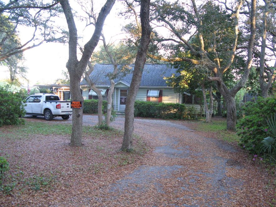 House is in bad shape. Options could be to purchase house ''as is'' and use or purchase for land only and redevelop into 3 or more lots. Has nice Live Oak trees, close to Cinco Bayou.