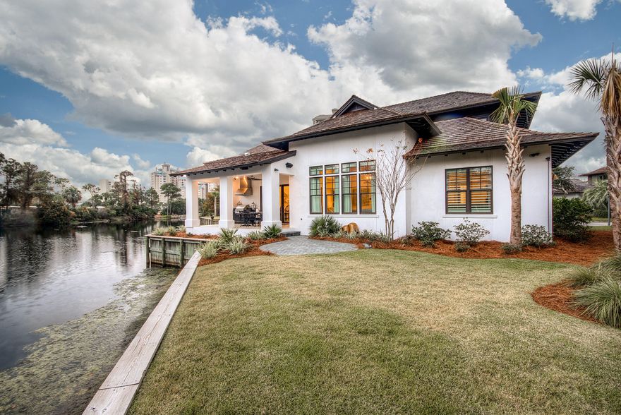 RARE OPPORTUNITY TO OWN A BEACH HOME IN SANDESTIN !!! ISLAND ESTATES is a GATED BEACH ENCLAVE of 9 homes on a lake on the Beachside of the Sandestin Resort, just a short walk to the beach. This West Indies style home will have an OPEN CONCEPT FLOOR PLAN with 4 Bedrooms 4.5 baths, large back porch, and an oversized 2 car garage PLUS GOLF CART GARAGE. HARDWOOD FLOORS THRU OUT THE HOUSE. LIVING ROOM HAS 12 FT. CEILINGS WITH WHITE WASHED BEAMS. Private Master Suite with spa like bath and 2 large walk in closets is located on the First Floor along with a 2nd Bedroom and bath. Upstairs has 2 bedrooms 2 baths and a 2nd Living Area. GOURMET KITCHEN WITH WALK IN PANTRY. THIS HOME ALSO FEATURES THE LATEST TECHNOLOGY UPGRADES ''CONTROL 4''. CALL TODAY TO SEE THIS AWESOME HOME !