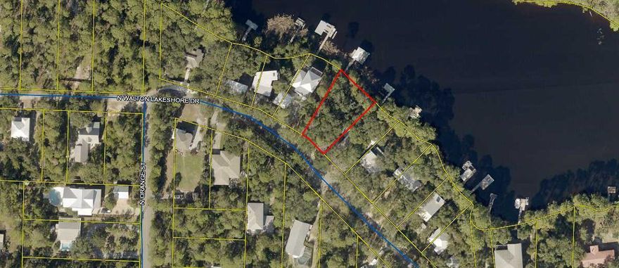 NEW covered boat dock with boat lift  included at this incredible offering on beautiful Lake Powell in Inlet Beach. Just over 1/4 acre lot with 95' of lake frontage. Just 2 miles from highway 30A and Rosemary Beach.