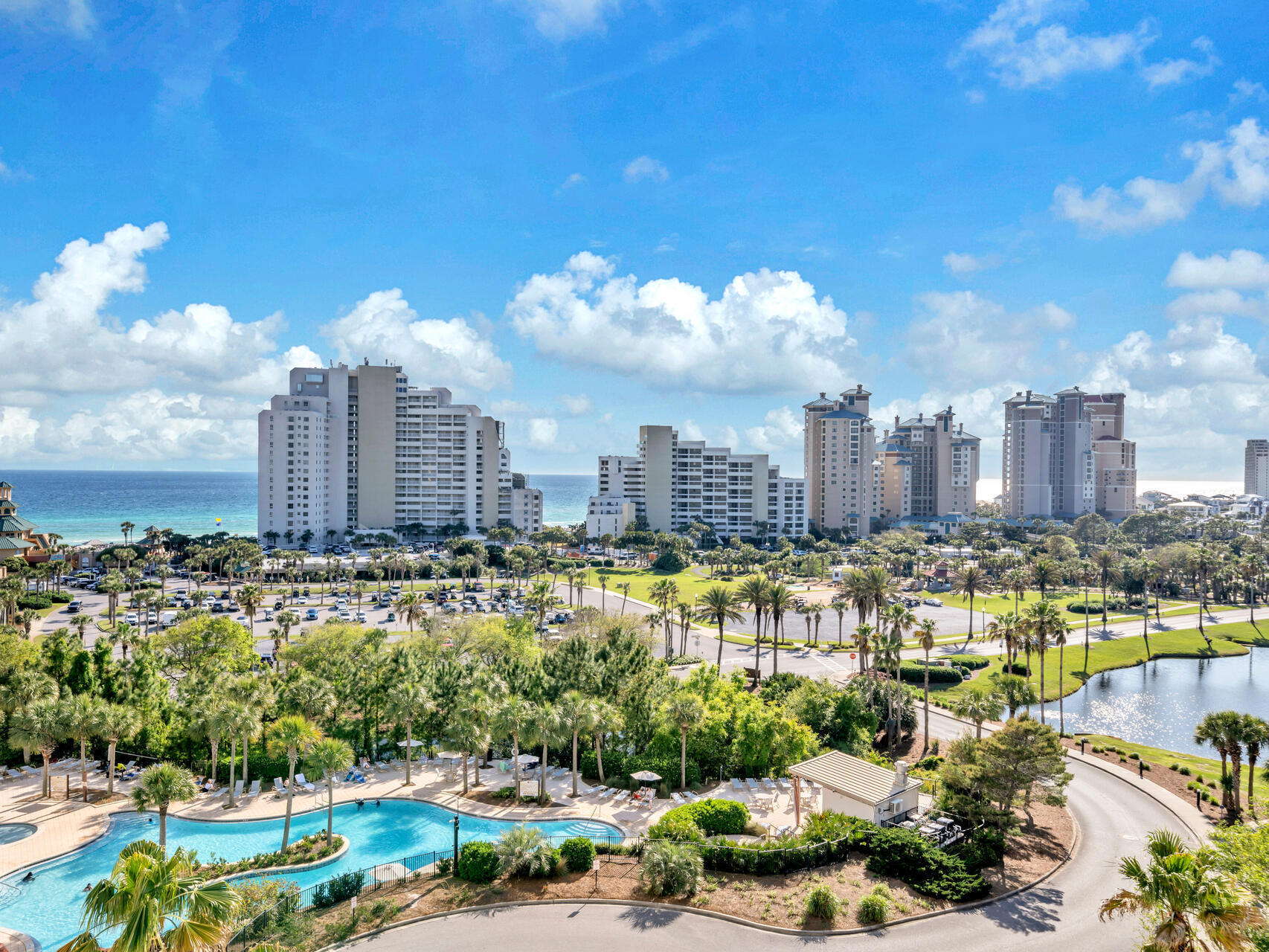 West-facing, 7th floor for the best Day and Evening views - Gulf, Lake and Bay! LPV flooring throughout, HVAC replaced Sept. 2021 and water heater in May 2024. Located in the gated Luau complex, on the south side of Sandestin Resort, you will enjoy an abundance of amenities, including a resort sized pool with waterfall, seasonal tiki bar, hot tub, outdoor grilling & lounge facility, covered parking, storage cage for owner belongings, fully equipped fitness center, sunset deck to enjoy sunsets. Plus, a walkway for the short stroll TO THE BEACH! Truly a self-contained oasis.