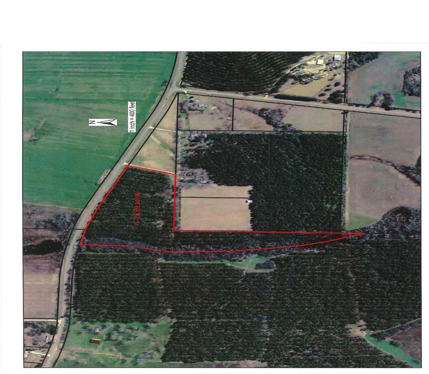 20.69 acres located in Northwest Walton County. Property has lots of paved road frontage and well over 1000 feet of creek frontage. The tract has had the timber cut. It is loaded with deer, turkey and wild hogs.