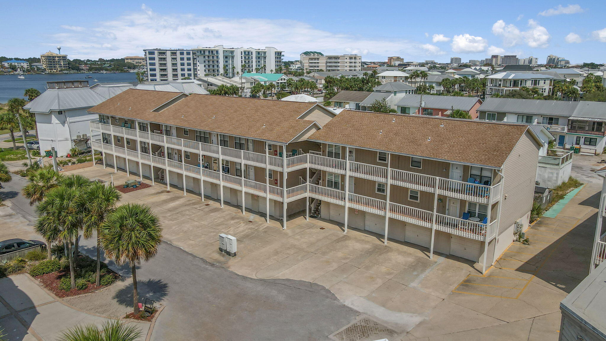 PENDING - TAKING BACK UP OFFERS. Welcome to your next investment or personal beach retreat!  Nautical Way is VA approved, allows short term rentals, and is amazingly priced for south of 98!  Talk about potential for ROI.  This property has proven income of over $50,000 in the last 12 months.  This home also comes turnkey (check out the owner's closet) and includes linens, programmable door lock, outdoor camera, outdoor and indoor owner's closets, and a one car garage - making room for your golf cart, all the beach gear, and your bicycles. In addition to this condo being rental ready and income producing, check out its proximity to the beach. Being located on Holiday Isle this condo has so much to offer. Holiday Isle includes private beach access,