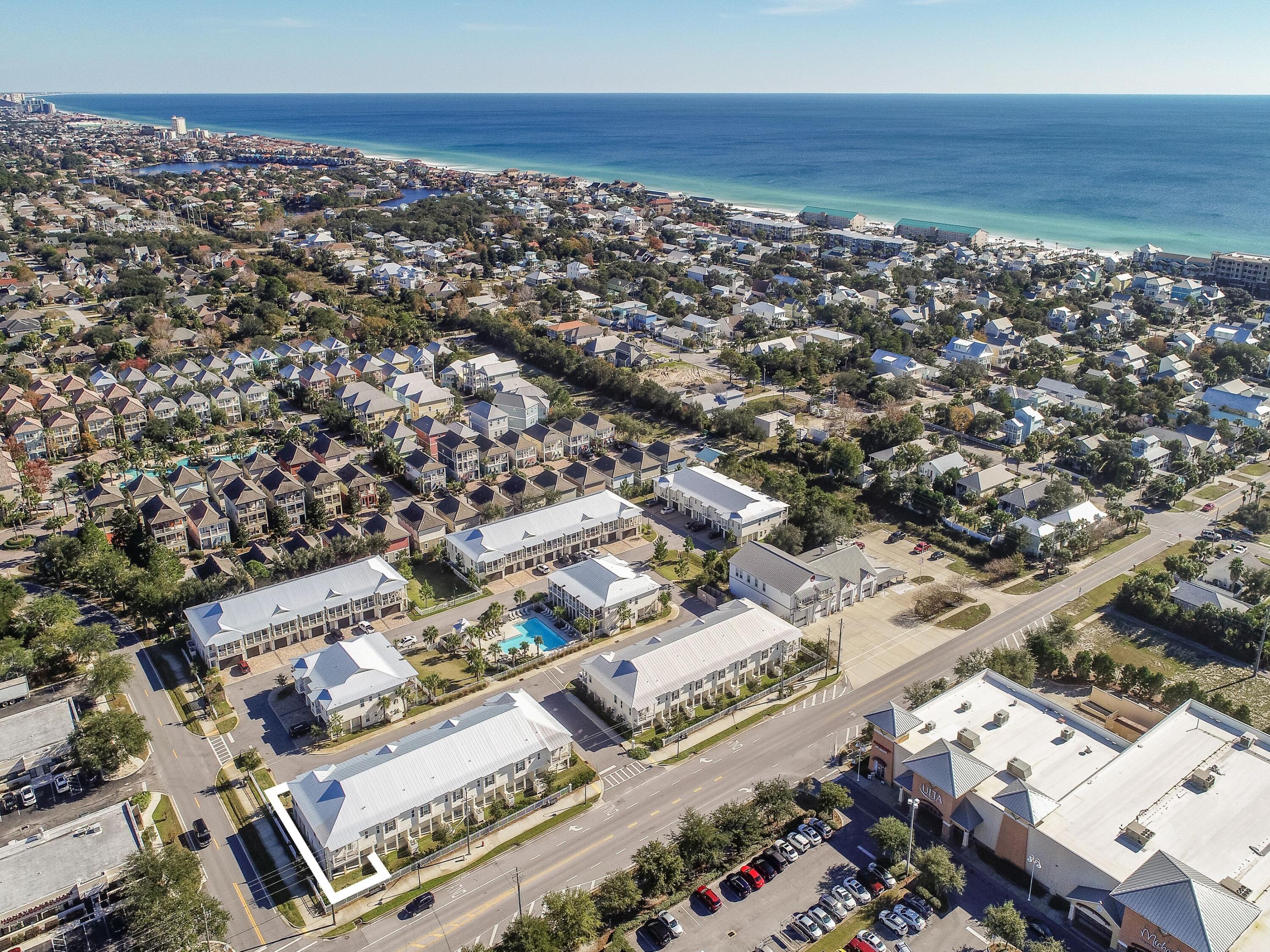 One Twenty Five Crystal Beach Drive is a resort-style townhome community located in the heart of Crystal Beach, a quaint seaside community in Destin, Florida. Ideally situated between Destin's beaches (3 blocks away) and the award-winning Destin Commons, One Twenty Five Crystal Beach Drive is convenient to numerous shops, restaurants, a movie theater, bowling alley and so much more. The beautiful pool is centrally located and the community also has a dog park. This spacious townhome residence is an end unit, has 4 bedrooms and 3 bathrooms and is a spacious 1983 square feet. The private 2-car garage offers security, convenience and plenty of storage! Exterior features hardi-plank siding, metal roofs, and impact resistant windows and doors! Interior features include 9 foot ceilings, stain- -less steel appliances, laminate wood and porcelain tile flooring, granite countertops, all wood cabinets, and spacious balconies. Low HOA fees include pool & dog park maintenance, all lawn maintenance, exterior painting, pest control and the roof reserves!