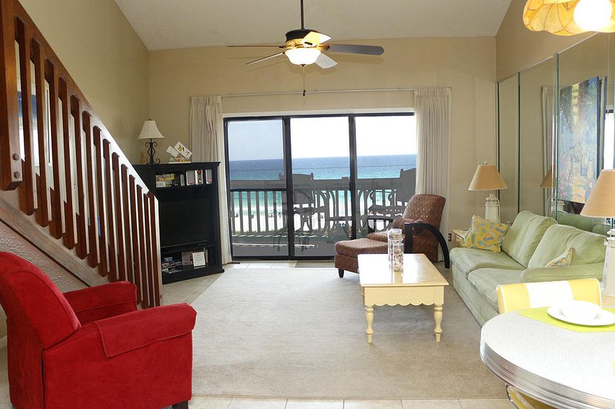 This 2-story condo with breath-taking and unobstructed views of the gulf is completely remodeled and fully furnished. There is also a community pool and BBQ Pit area. It's a 2BR/2BA unit at the West End of the beach located right next to the Carousel Supermarket making grocery shopping a breeze. This home also has wide open gulf views! **The beach in front of this unit is protected and can never be built on!** Home features two story living area with soaring high ceilings, plus each bedroom has its own bathroom! The home has one bedroom downstairs, and the other is a loft styled bedroom upstairs, making it feel nice and roomy! Home also features new dish washer, refrigerator, and microwave, as well as new water heater. This unit is VERY clean and well