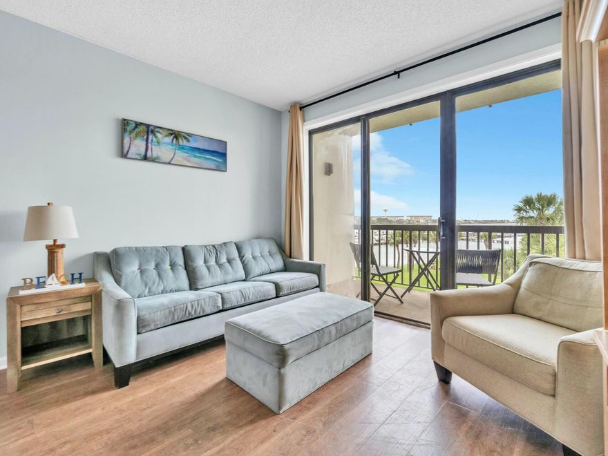 Back on Market due to buyer job relocation, this is your second chance to own this incredibly valued condo with 36 Ft BOAT SLIP INCLUDED! Enjoy breathtaking views of the Sound, Marina, and Pool from this charming waterfront studio condo. Wake up to the sunrise view while sipping coffee on your  private balcony knowing your boat awaits just steps away. The unit comes fully furnished, freshly painted with new patio furnishings, plus a newer A/C and water heater (both under 3 years old). With a strong rental history, VA approved, this condo is Perfect for  or living or investment - both short and long term rental allowed.  Owners can also rent out the boat slip for additional income.  This is the ideal coastal lifestyle you've been looking for at a surprisingly  affordable price. Call today!