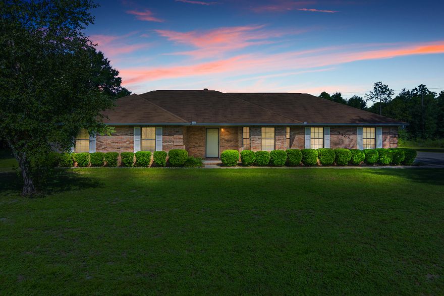 Stop the car and look no further.. This meticulously maintained all brick home is a must see in a well established neighborhood! Your new home features a spacious living room with vaulted ceilings, a nice fireplace and new lvp wood flooring throughout the home. The master suite features a large bedroom with access to your Florida room outback. This room is perfect for a morning cup or coffee or enjoying the Florida sunshine. If you are the outdoors type and love to entertain this large lot is a must! This 1.55 Acre lot will provide plenty of room for the kids to play and plenty of room to entertain at those large family gatherings and weekend BBQ's. To top things off you will have plenty of parking space and work space between your oversized garage and detached 22x18 workshop!