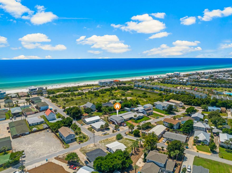 Discover a prime investment opportunity in Panama City Beach's coveted west end, just 0.2-miles from doorstep to Public Beach Access #92 and the Gulf's white sand beaches. Only 4 miles from upscale dining and shopping at 30Avenue or Rosemary Beach, and 7 miles from Pier Park and Frank Brown Park--home to events like Gulf Coast Jam--this location is unmatched for coastal living. This versatile duplex offers flexibility for buyers. The upstairs unit, with a kitchen, living area, dining space, one bedroom, and a full bathroom, can be reconfigured into a two-bedroom, one-bath layout. Enjoy a spacious 26' x 16' balcony with partial Gulf views and a sunroom, perfect for relaxing or soaking in sunsets. The downstairs unit has a ground level entry into the open living, dining and kitchen space. There are 2 bedrooms and a full bathroom downstairs. There is a single garage that is perfect for a golf cart and beach supplies. For savvy investors, this property is a rare find with multiple revenue streams. Continue its proven success with long-term or short-term rentals. There is ample space for a pool, carriage house, an addition and other enhancements. Unlike a single-family home, this duplex offers dual-income potential or the option to live in one unit while renting the other. This classic coastal gem blends timeless charm with significant investment potential in one of Florida's premier beach destinations.