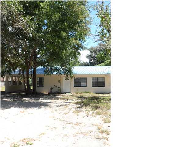 This is a great starter home, move in ready. This 2 bedroom/1 bath unit offers tile flooring through out, inside washer and dryer hook ups, a large carport and plenty of yard space to enjoy friends and family. Call today for viewing instructions. Small pets allowed under 25 lbs with references. No smoking!