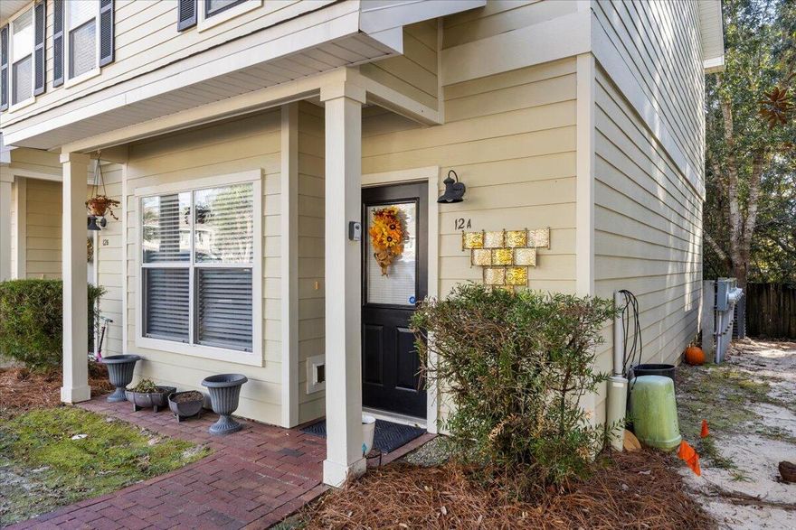 Beautifully updated townhome in the heart of Freeport. This 2-bedroom, 2.5-bath residence features a fully renovated kitchen with new appliances, quartz countertops, fresh paint, and tile flooring. The first floor offers a spacious open-concept living area, a storage closet, and a half bath, along with the kitchen and dining area--each enhanced with new hardwood flooring, updated lighting, and fresh paint.Upstairs, the primary bedroom includes two closets, updated paint, and a completely remodeled en-suite bathroom with an elegant, high-end design. The second bedroom, also with a large closet and updated paint, sits adjacent to another fully renovated full bathroom showcasing modern, stylish finishes. The staircase and upper-level feature newer carpet, while all bathrooms are finished with tile flooring. Washer and dryer hookups are conveniently located on the second floor, and both appliances are included.

As a corner unit, this townhome provides a private back deck and two assigned parking spaces. It is located directly across from the community pool and dog park in a quiet, low-traffic neighborhood. The community sits just across the highway from the elementary school and offers easy access to local restaurants and shopping, while being only about 15 miles from 30A beach access.