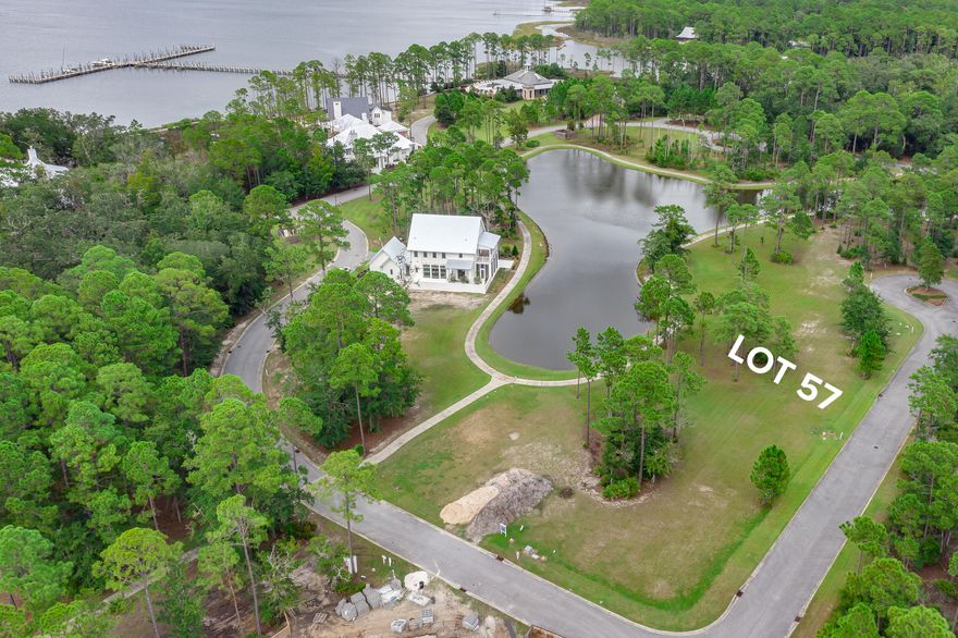 Churchill Oaks Lot 30 is a lake front homesite with beautiful views of the spring-fed lake and outstanding new home potential. Tucked away with only native vegetation and the calm waters of Hogtown Bayou in sight, Churchill Oaks offers a lifestyle of elegance and appreciation of nature. Once inside the stately gated entrance, magnificent coastal homes accentuate southern architecture under a canopy of old oak trees. The 40-acre community is comprised of 87 homesites and some of the best amenities in South Walton, including a brand-new private deep water marina. The marina project includes 36 private boat slips, paddle board storage decks, a fish cleaning station, shoreline stabilization + more!