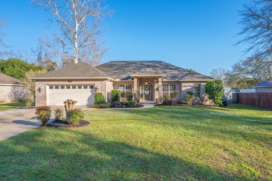 **2.375% Assumable VA Loan Option**Stunning Saltwater Pool Home on a Half-Acre Lot in North Crestview!This award-winning home, a 2006 Parade of Homes winner, offers a spacious and beautifully designed layout. Featuring 4 bedrooms, 2 baths, and an expansive 2,400+ sq. ft. of living space, this home is perfect for both relaxing and entertaining.The large family room welcomes you with an open, airy feel, while the formal dining room and cozy breakfast nook provide ideal spaces for meals and gatherings. The chef's kitchen boasts stainless steel appliances, granite countertops, and a convenient breakfast bar, with a huge pantry offering plenty of storage.The front bedroom, which could easily function as an office or hobby room, provides added versatility. The master suite is a true retreat, with a tray ceiling, crown molding, and direct access to the pool area. The custom-built master closet offers ample space, and the en-suite master bath features a separate shower, jetted garden tub, and dual vanities for ultimate comfort.

Step outside into your private backyard oasis, complete with a sparkling in-ground saltwater pool, lush landscaping, and a full-yard sprinkler system. The yard also includes fruit trees, adding charm and beauty to the setting.