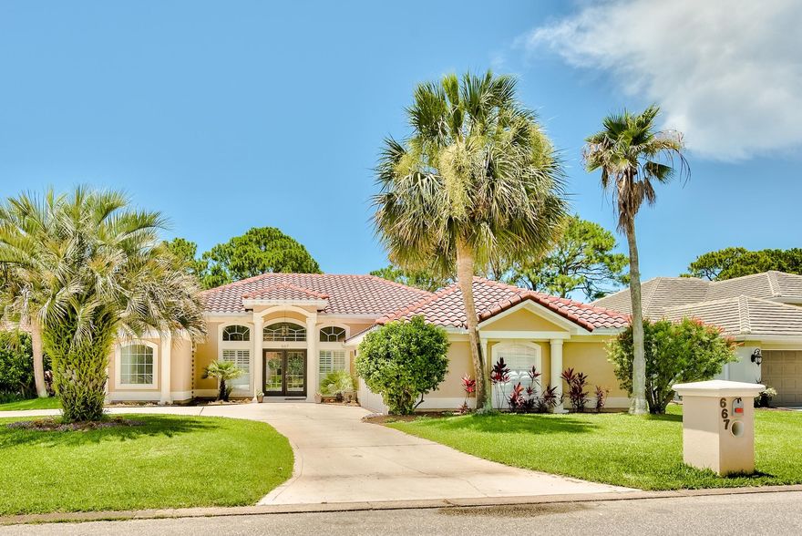 Inside the gates of the celebrated Emerald Bay neighborhood lies this newly updated custom-built home. Upon entering the double entry glass inlay doors, you will be greeted with raised ceilings that highlight the open floorplan that seamlessly flows throughout 4 bedrooms and an additional flex/office space. The kitchen boasts incredible touches with upgraded appliances, custom cabinetry & a mahogany bar perfect for entertaining. The current owners have meticulously cared for this property and recently installed tailored plantation shutters throughout. The large, screened lanai is the perfect addition, providing a perfect outdoor entertaining space completed with an outdoor kitchen area. This home sits on a generously sized lot along the fourth green of the renowned Emerald Bay golf course.
