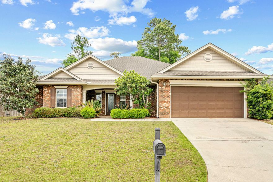 Welcome home!This Cambridge plan features split bedroom plan and has 4 bedrooms and 2 1/2 baths, located just South of I-10. As you enter the front door, you will see a ''mud area'' to your left and a half bath and laundry  room to your right. Straight  ahead you enter a  spacious living  room with french doors that take  you to the heated/cooled sunroom. To the right of the living  room is the gorgeous  designed kitchen with granite counter tops and stainless appliances.The master suite offers a beautiful  bathroom with a  tub, separate shower, and walk-in closet. Three other bedrooms are perfect for guests or kids. Schedule your showing today!
