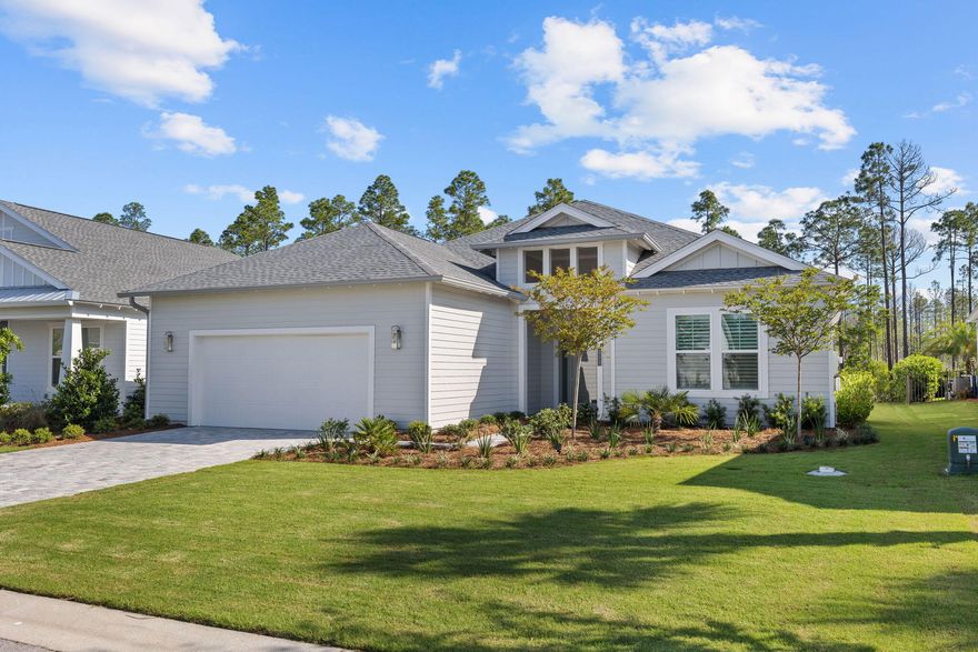 Currently under contact with contingencies.  72 hour kick out clause in effect, call Listing Agent with inquiries. Entertainers Dream in Inlet Beach!  Come join the Watersound Origins community with this furnished gem filled with upgrades. This 3 Bed/3 Bath exquisite home was built in 2023 and features many upgrades.  Follow the stone drive up to the entryway and prepare to be wowed by statement wall in the foyer and the spacious floor plan that opens before you.  As you walk into the living area you will notice the oversized dining room and the living room complete with a marble TV surround.  Between the kitchen and dining room, there is seating for 20 and the doors in the living room open accordion style to reveal the extended lanai with its own outdoor kitchen!