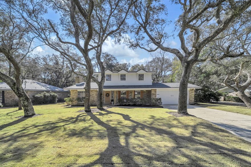 Perfectly positioned beneath mature oak trees in the heart of Poquito Bayou, this completely renovated 4-bedroom, 3-bathroom home blends timeless curb appeal with modern upgrades. Its classic brick exterior and welcoming front porch create a striking first impression, while the spacious lot offers both privacy and room to grow.Inside, a charming foyer opens to two generous living areas, creating an ideal layout for gathering, entertaining, or relaxing. New luxury vinyl plank flooring flows throughout, leading into the beautifully updated kitchen featuring real wood cabinetry, brand-new stainless steel appliances, updated fixtures, and thoughtful built-ins including custom bookshelves and a wine rack. The adjoining dining room connects seamlessly to a large concrete patio, offering an effortless indoor-outdoor flow that's perfect for hosting.

Cozy up by the fireplace on cooler evenings or envision future gatherings in the expansive backyard, with plenty of space to add a pool and design your own private retreat.
Truly move-in ready, this home showcases fresh interior paint, modern finishes, and fully renovated bathrooms. All three baths have been thoughtfully upgraded with new vanities, toilets, tile work, and fixtures, including new tubs with tiled surrounds upstairs and a glass-enclosed shower downstairs.

For added peace of mind, major system updates include a brand-new roof (2025), full electrical rewire with new panel (2026), new garage door and opener, newer HVAC system (2017), and water heater (2021).

Located within walking distance to the neighborhood playground and public boat launch, and conveniently positioned between Eglin Air Force Base and Hurlburt Field, with the white sandy beaches of Okaloosa Island just a short drive away, this home offers an exceptional balance of work and play.
Space, style, updates, and location  this one truly checks every box.
