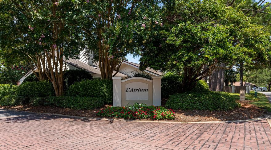 Tucked away on the western side of Sandestin Golf & Beach Resort in a circle of 47 Homes, 325 L'Atrium offers serenity and seclusion, yet is still convenient to all the Resorts amenities.This 3 Bedroom 2 Bath home is located on an end lot. Once inside, you will find an open dining and living room with a Vaulted ceiling and a wood burning fireplace. A Sliding Door leads out to a patio and private backyard enclosed with a privacy fence. Also off the Living Room is an atrium, which provides even more light and an added outdoor seating area. The Kitchen has been remodeled and has a beautiful window overlooking the backyard. The Master bedroom features a walk in closet and an en suite bathroom with double vanities. Tile Flooring in Living Area and New Carpet in the bedrooms. 2 Car Garage