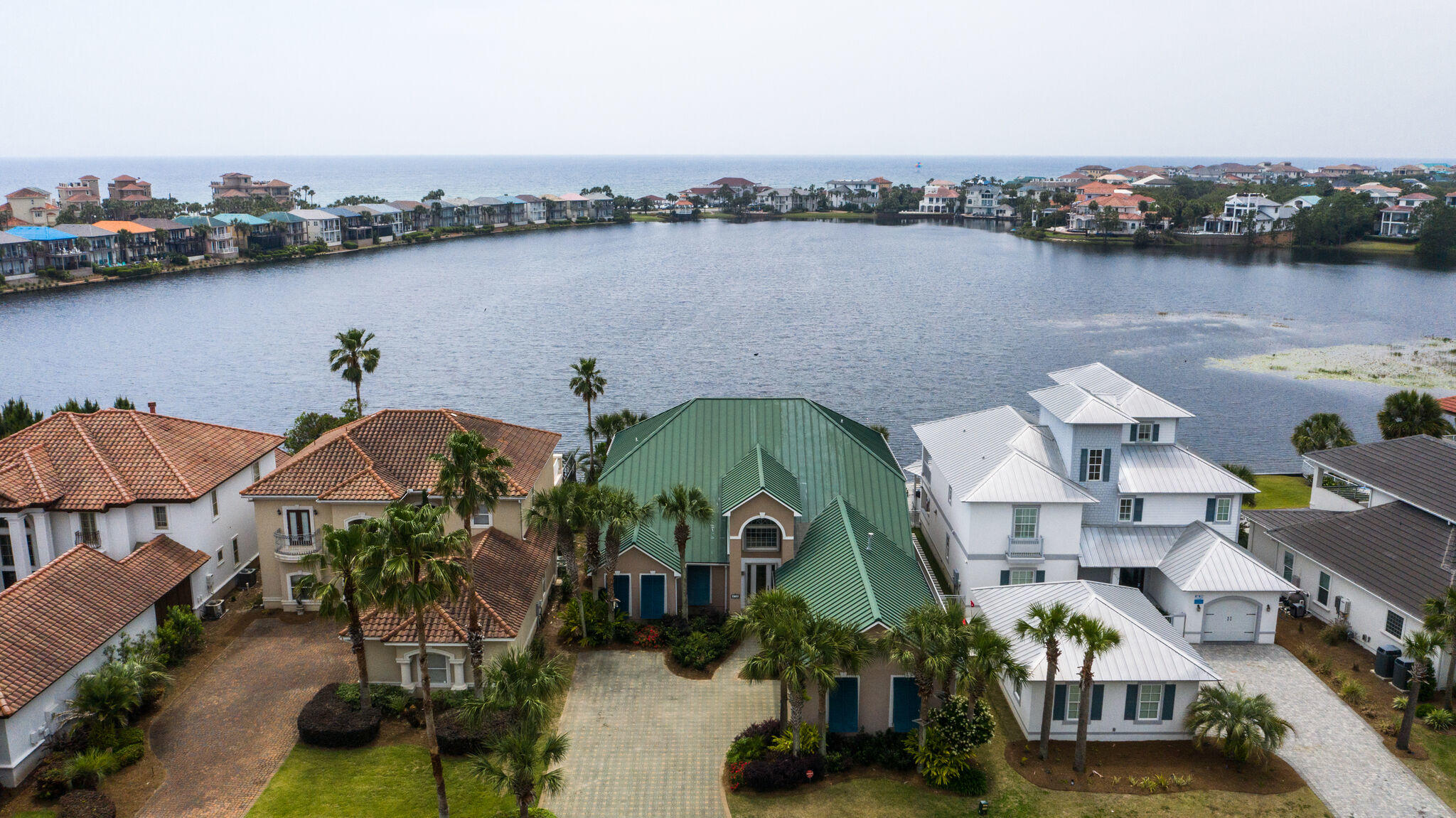 You do not want to miss out on the immaculate custom built lake house of your dreams. Sitting right on Four Prong Lake, this home has been lovingly cared for by the original owners since it was built and is in like-new condition. Whether you are looking for a dreamy primary residence or the ideal investment opportunity, this must-see home is full of potential with rental projections north of $100,000. No expense was spared in the build and design of this stunning home, which is immediately apparent from the moment you walk in. Natural light fills the space, highlighting the top-of-the-line finishes, designer flooring and completely open concept living area.