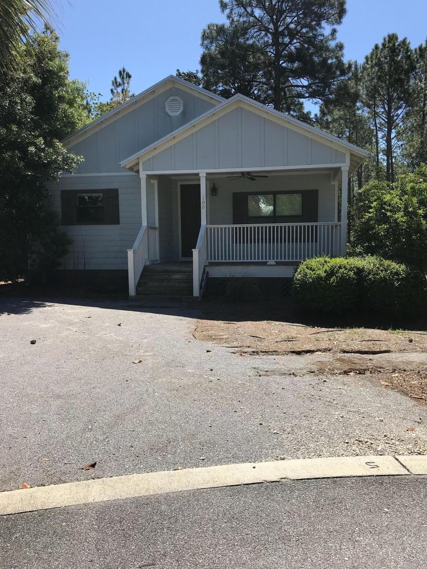 Rare Opportunity to own your own property in a beautiful gated community with sidewalks near the Bay!! Convenient and easy access to the beaches on the Scenic 30-A Corridor AND Destin, Hospital and Silver Sands Outlet Mall. Well maintained three bedroom, two bath home in move-in condition. Low HOA fees. A MUST SEE!! This one won't last long.Buyer to verify all dimensions.