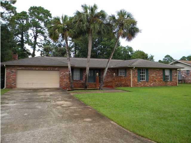 Incredible home with tons of space and a huge yard. 4 bedrooms, 2 baths with 1,962 SF. Immaculate on the inside and outside. This home has a formal dining room, living room and family room with a fireplace. Outside there is a nice screened porch and beautiful yard with plenty of room for a swimming pool. Convenient location and incredible Lynn Haven neighborhood surrounded by beautiful homes. This is a short sale but lender approval will be very fast. Make an appointment to see this home.