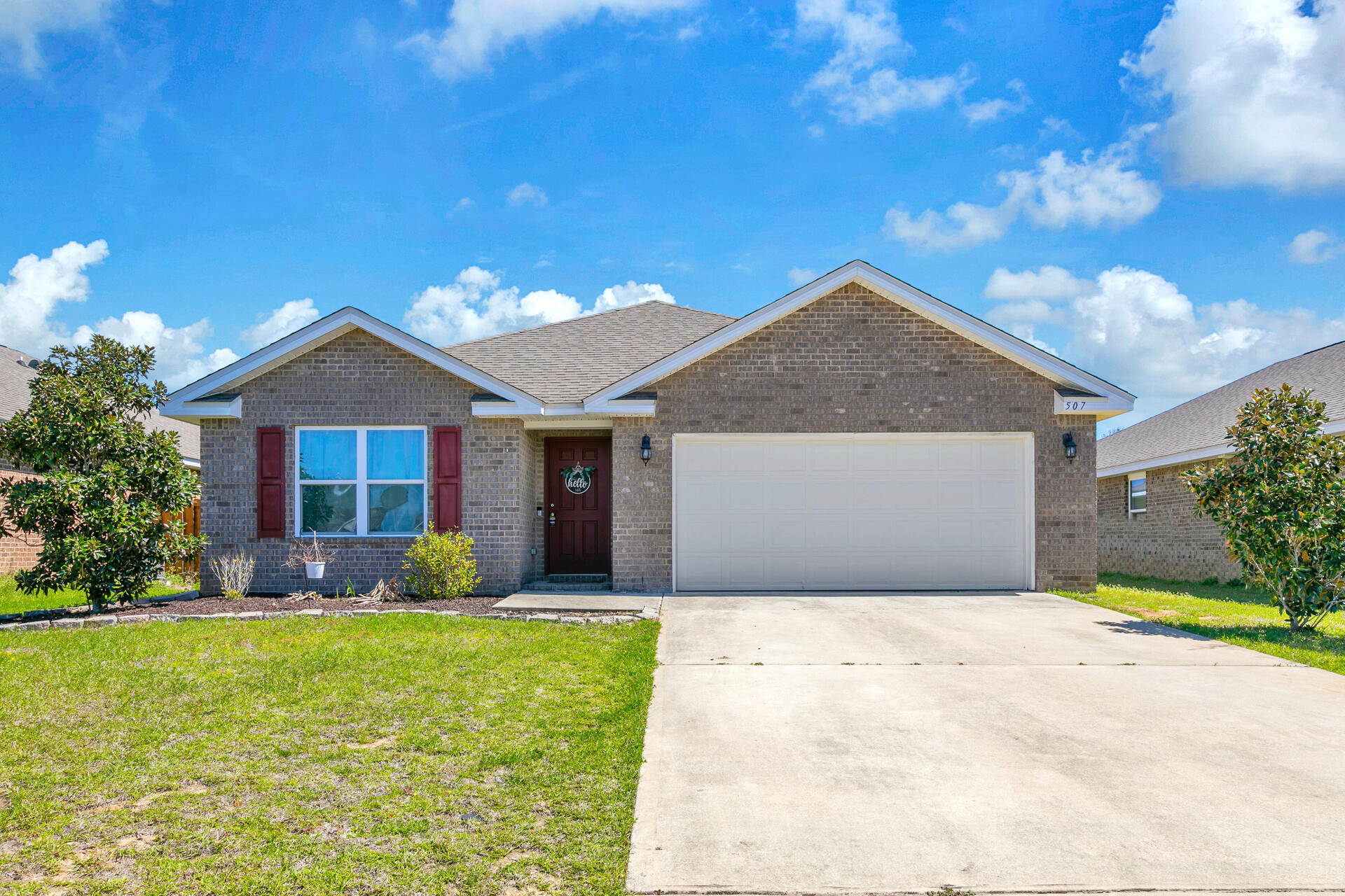 Seller to give $5K buyer credits at closing with satisfactory offer! For sale or Rent! Welcome to Redstone! This 4/2 DR Horton home has the highly sought open floor plan. The wide open kitchen seamlessly fuzes the living space with endless options for furniture configuration. The master is nestled in the back of the house with a double vanity bathroom, large soaker tub, and a spacious walk in closet. There are 3 guest bedrooms that tie the front full bath into a wide atrium, split by a large walk-in laundry room. The back yard has plenty of space with no neighbors behind! The two car garage has epoxy floors. The amenity key accesses 2 sparkling community pools, a fenced Dog Park, playground, and outdoor kitchen at the Clubhouse. Come see it today! The elementary and middle schools are conveniently across the main entrance, and the Gulf Beaches are only 40 minutes drive!